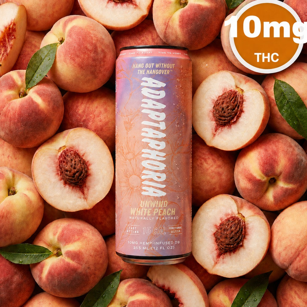 Adaptaphoria Unwind White Peach 10mg THC functional seltzer can on a bed of white peaches