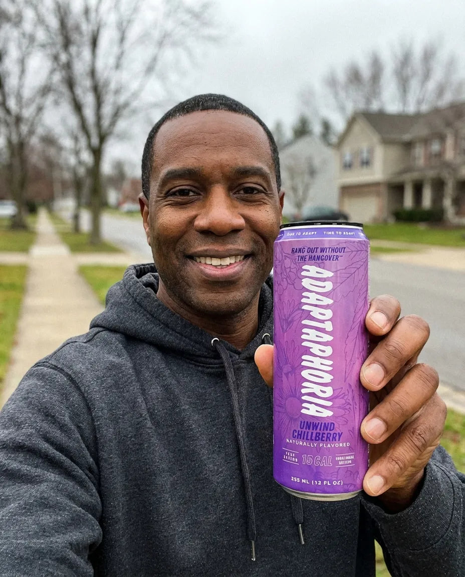 Akil P. holding Adaptaphoria White Peach